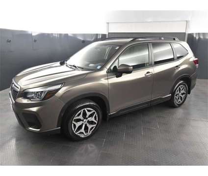 2020 Subaru Forester Premium is a Tan 2020 Subaru Forester 2.5i SUV in Rochester NY