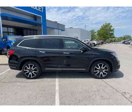 2021 Honda Pilot Touring 7-Passenger is a Black 2021 Honda Pilot Touring Car for Sale in Olathe KS