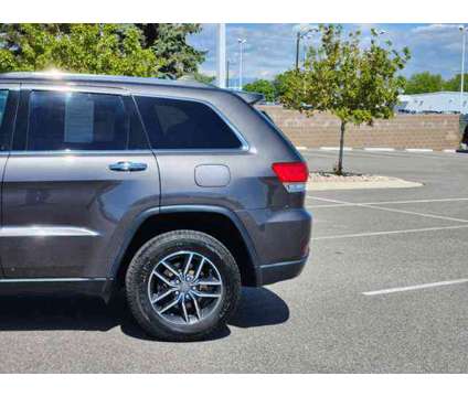 2019 Jeep Grand Cherokee Limited is a Grey 2019 Jeep grand cherokee Limited Car for Sale in Denver CO