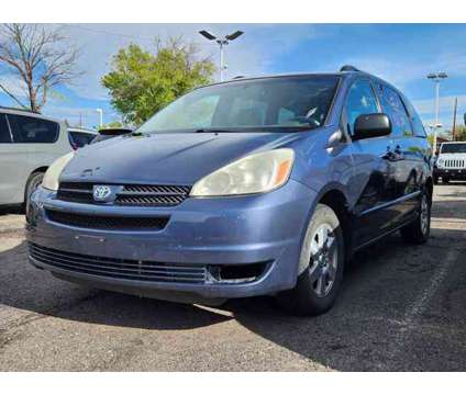 2005 Toyota Sienna LE is a Blue 2005 Toyota Sienna LE Car for Sale in Denver CO