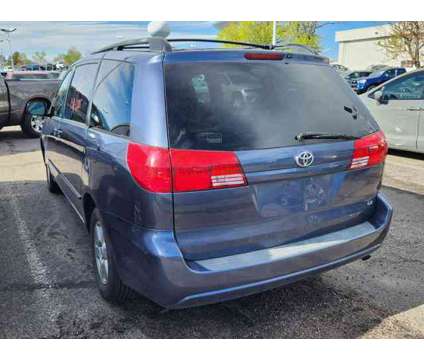 2005 Toyota Sienna LE is a Blue 2005 Toyota Sienna LE Car for Sale in Denver CO