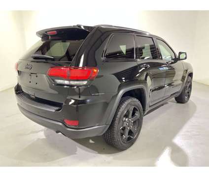 2021 Jeep Grand Cherokee Freedom is a Black 2021 Jeep grand cherokee Car for Sale in Traverse City MI