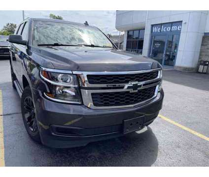 2016 Chevrolet Tahoe is a Grey 2016 Chevrolet Tahoe 1500 2dr Car for Sale in Buffalo NY