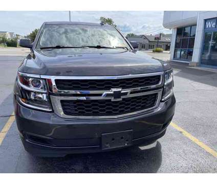 2016 Chevrolet Tahoe is a Grey 2016 Chevrolet Tahoe 1500 4dr Car for Sale in Buffalo NY