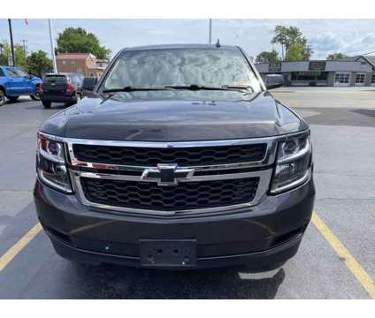 2016 Chevrolet Tahoe is a Grey 2016 Chevrolet Tahoe 1500 4dr Car for Sale in Buffalo NY