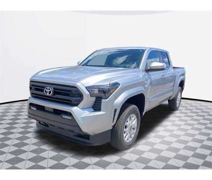 2024 Toyota Tacoma SR5 V6 is a Silver 2024 Toyota Tacoma SR5 Truck in Catonsville MD