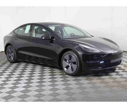 2022 Tesla Model 3 Long Range is a Black 2022 Tesla Model 3 Long Range Sedan in Bedford OH