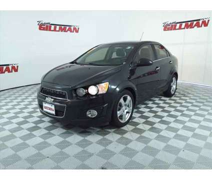 2015 Chevrolet Sonic LTZ is a Black 2015 Chevrolet Sonic LTZ Sedan in Houston TX