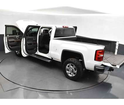 2018 GMC Sierra 2500HD SLT is a White 2018 GMC Sierra 2500 SLT Truck in Jackson MS