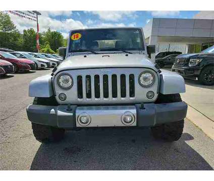 2018 Jeep Wrangler JK Unlimited Sahara is a Silver 2018 Jeep Wrangler Unlimited Sahara SUV in Cullman AL