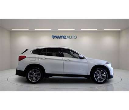 2017 BMW X1 xDrive28i is a White 2017 BMW X1 xDrive 28i SUV in Orchard Park NY