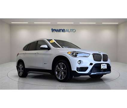 2017 BMW X1 xDrive28i is a White 2017 BMW X1 xDrive 28i SUV in Orchard Park NY