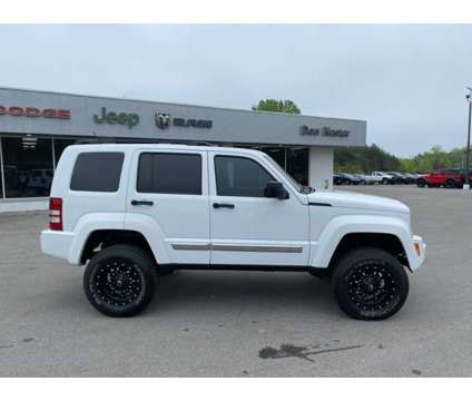 2012 Jeep Liberty Sport is a White 2012 Jeep Liberty Sport SUV in Houghton Lake MI