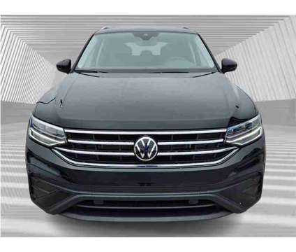 2024 Volkswagen Tiguan 2.0T SE is a Black 2024 Volkswagen Tiguan 2.0T S SUV in Fort Lauderdale FL