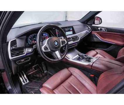 2021 BMW X5 M50i is a Grey 2021 BMW X5 4.8is SUV in Spring TX