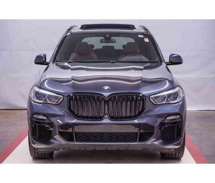 2021 BMW X5 M50i is a Grey 2021 BMW X5 4.8is SUV in Spring TX