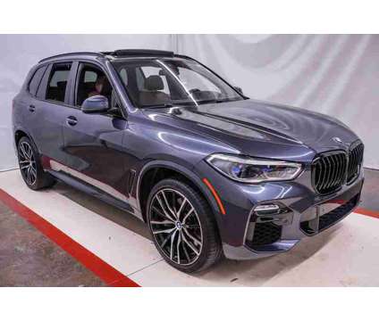 2021 BMW X5 M50i is a Grey 2021 BMW X5 4.8is SUV in Spring TX