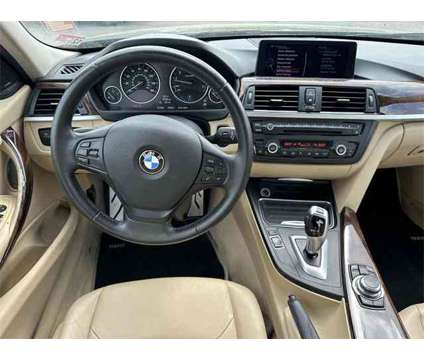 2013 BMW 3 Series ActiveHybrid 3 is a Blue 2013 BMW 3-Series Sedan in Springfield VA