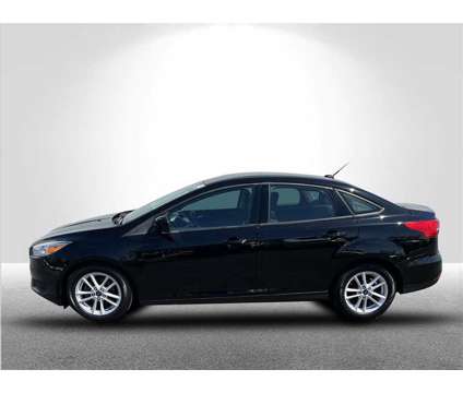 2018 Ford Focus SE is a Black 2018 Ford Focus SE Sedan in Clinton Township MI