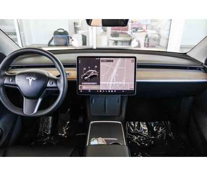 2022 Tesla Model Y Long Range is a Black 2022 Station Wagon in Ontario CA