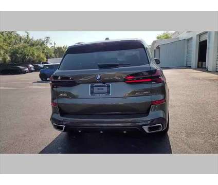 2025 BMW X5 sDrive40i is a Green 2025 BMW X5 3.0si SUV in Jacksonville FL