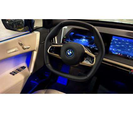 2025 BMW iX xDrive50 is a Blue 2025 BMW 325 Model iX SUV in Huntington Station NY