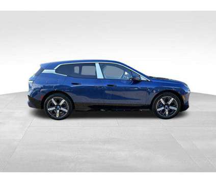 2025 BMW iX xDrive50 is a Blue 2025 BMW 325 Model iX SUV in Huntington Station NY
