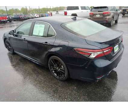 2021 Toyota Camry XSE Hybrid is a Blue 2021 Toyota Camry XSE Hybrid in Dubuque IA