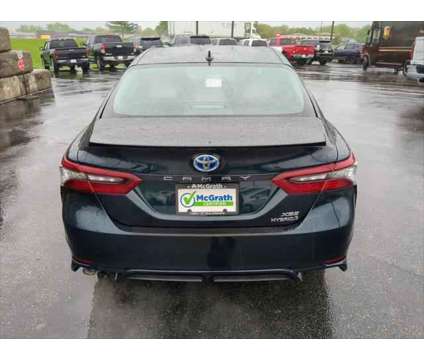 2021 Toyota Camry XSE Hybrid is a Blue 2021 Toyota Camry XSE Hybrid in Dubuque IA