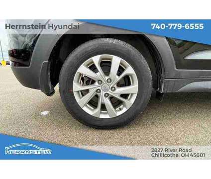 2021 Hyundai Tucson SE is a Black 2021 Hyundai Tucson SE SUV in Chillicothe OH