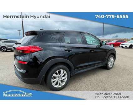 2021 Hyundai Tucson SE is a Black 2021 Hyundai Tucson SE SUV in Chillicothe OH