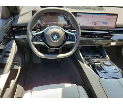 2024 BMW 5 Series i xDrive is a Grey 2024 BMW 5-Series Sedan in Milford DE