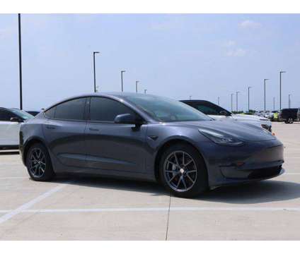 2022 Tesla Model 3 Long Range Dual Motor All-Wheel Drive is a Silver 2022 Tesla Model 3 Long Range Sedan in Friendswood TX