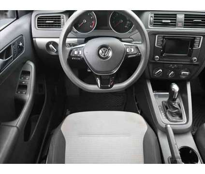 2017 Volkswagen Jetta 1.4T S is a White 2017 Volkswagen Jetta 1.4T S Sedan in Dubuque IA