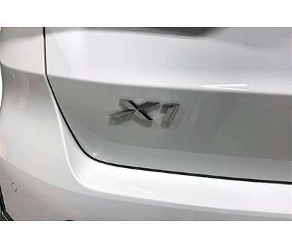 2024 BMW X1 xDrive28i is a White 2024 BMW X1 xDrive 28i SUV in Grand Blanc MI