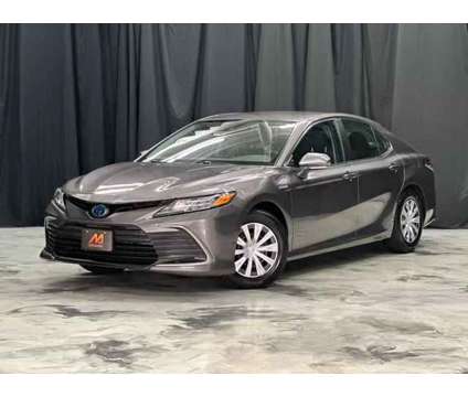 2021 Toyota Camry Hybrid for sale is a Grey 2021 Toyota Camry Hybrid Hybrid in Elgin IL