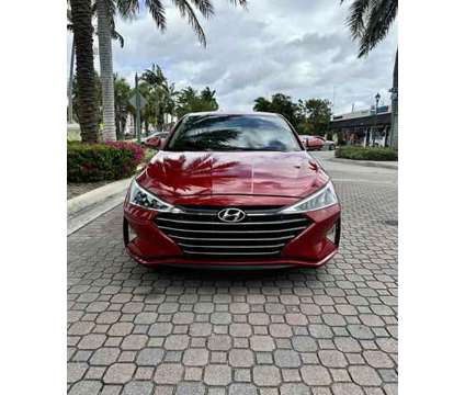 2019 Hyundai Elantra for sale is a Red 2019 Hyundai Elantra Car for Sale in Oakland Park FL