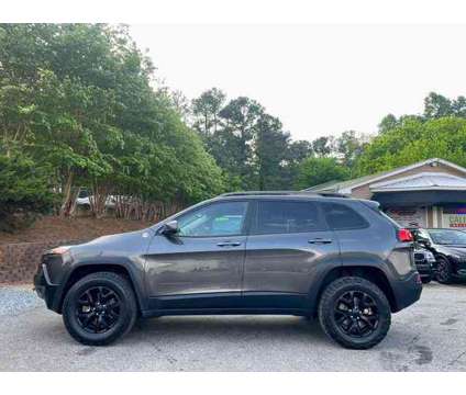 2016 Jeep Cherokee for sale is a Grey 2016 Jeep Cherokee Car for Sale in Duluth GA