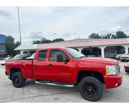 2011 Chevrolet Silverado 1500 Extended Cab for sale is a Red 2011 Chevrolet Silverado 1500 Extended Cab Car for Sale in Haines City FL