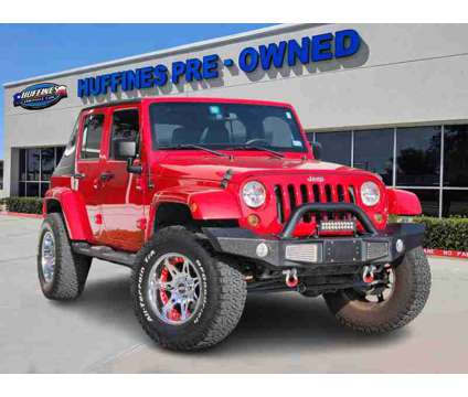 2012UsedJeepUsedWrangler UnlimitedUsed4WD 4dr is a Red 2012 Jeep Wrangler Unlimited Car for Sale in Lewisville TX