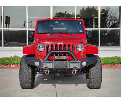 2012UsedJeepUsedWrangler UnlimitedUsed4WD 4dr is a Red 2012 Jeep Wrangler Unlimited Car for Sale in Lewisville TX