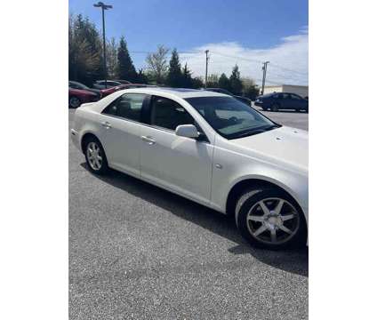 2005UsedCadillacUsedSTSUsed4dr Sdn V8 is a White 2005 Cadillac STS Car for Sale in Cockeysville MD