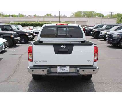 2016UsedNissanUsedFrontierUsed2WD Crew Cab SWB Auto is a White 2016 Nissan frontier SV Truck in Greenwood IN