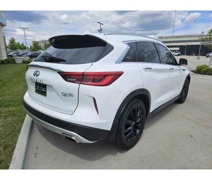 2021 Infiniti Qx50 Luxe is a White 2021 Infiniti QX50 Luxe Car for Sale in Elkhorn NE