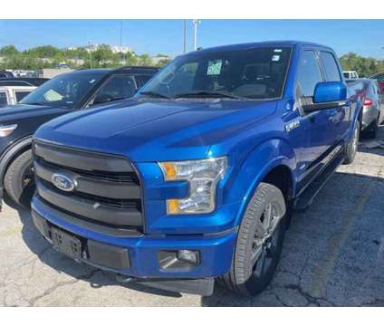 2017 Ford F-150 Lariat is a Blue 2017 Ford F-150 Lariat Car for Sale in Olathe KS