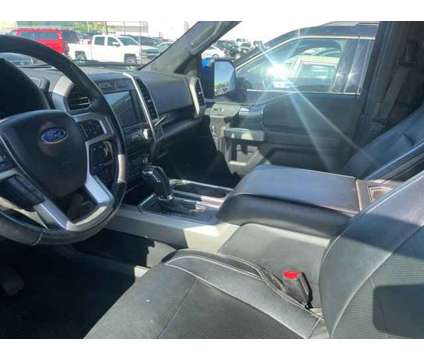 2017 Ford F-150 Lariat is a Blue 2017 Ford F-150 Lariat Car for Sale in Olathe KS