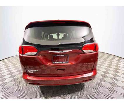 2021 Chrysler Voyager LXI is a Red 2021 Chrysler Voyager Car for Sale in Tampa FL