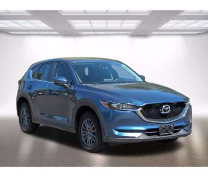 2017 Mazda CX-5 Touring is a Blue 2017 Mazda CX-5 Touring Car for Sale in Manchester CT