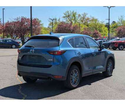 2017 Mazda CX-5 Touring is a Blue 2017 Mazda CX-5 Touring Car for Sale in Manchester CT