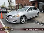2014 Nissan Altima with 120,490 miles!